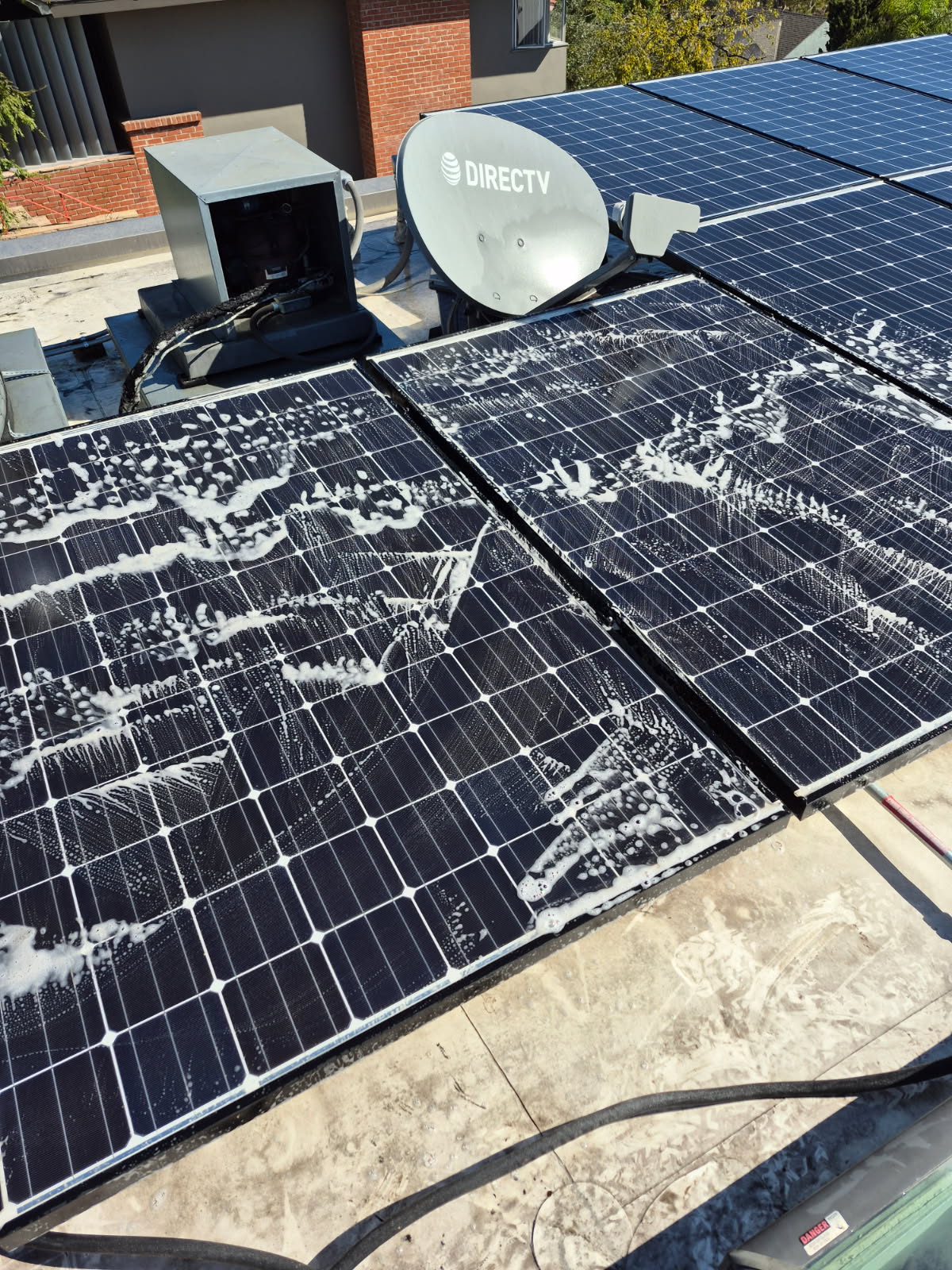 Dirty residential solar panels before cleaning